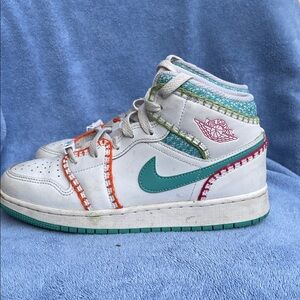 Nike High-Top Sneakers with Teal and Orange Accents